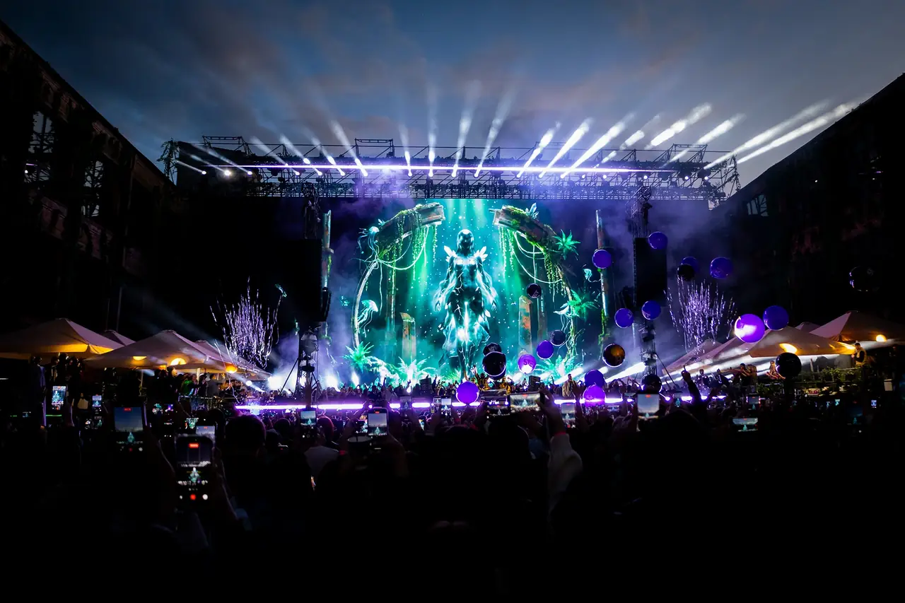 Crowd filming the visual show at a concert